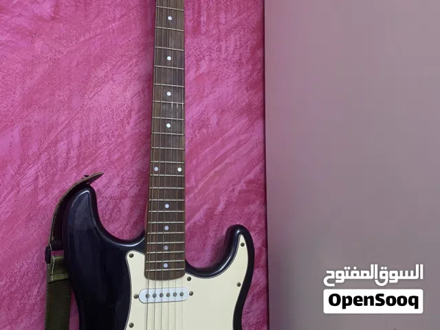 Fender Stratocaster - Black with Gold Anodized Pickguard