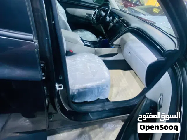 توسان 2023 فول مواصفات فتحه حساسات اماميه خلفيه اتو بارك كاميرا دوراره كشنات تدفئه تبريد بصمه صندوق