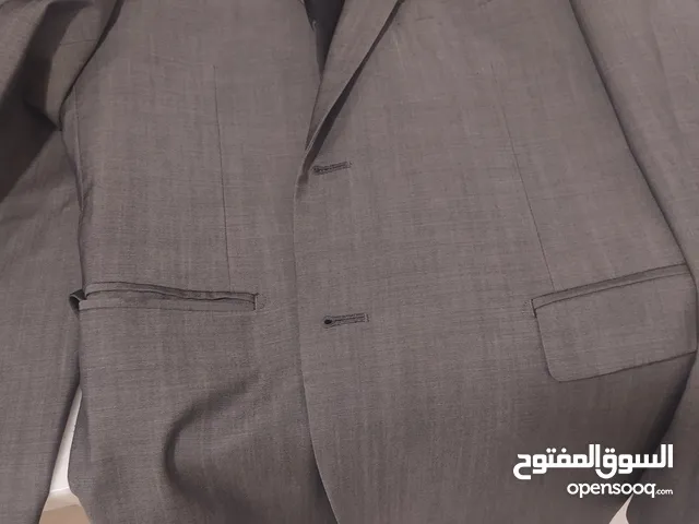 Sale used man official suits, brand clothes.price 15 BD