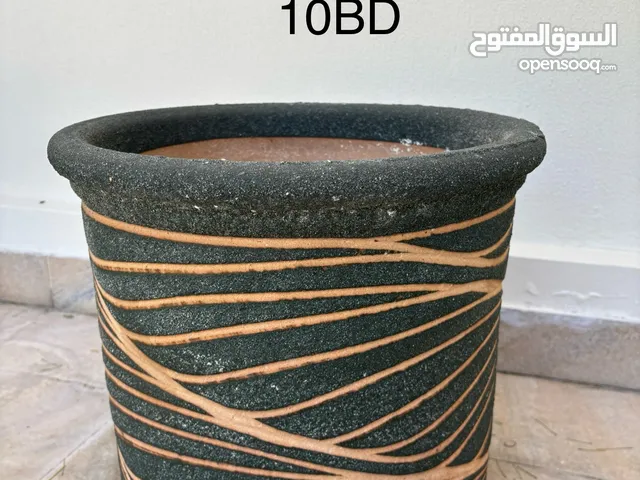 Ceramic pots, a mirror