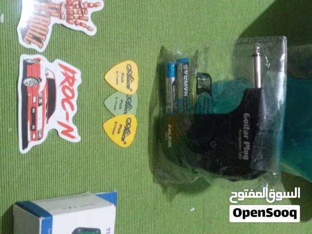 جهاز تحويل السماعه العاديه ل سماعة جيتار(امب) و  هدايا مميزه منها جهاز الدوران و ستكرز و ريشات