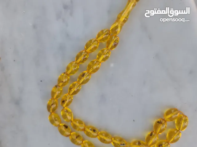 مسبحه كهرمان نمل حقيقي