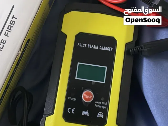 شاحن بطارية جديد مع الكرتونة