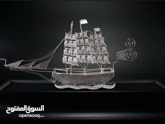 Ship statue, made of pure silver, handmade, trend 2025 , beautifulllllllllllllll