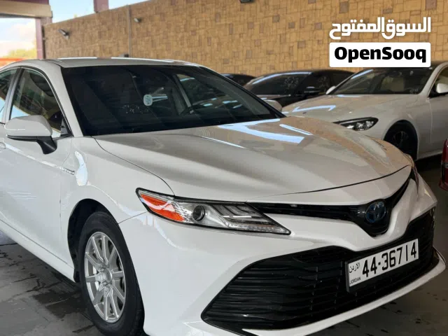 2019 تويوتا كامري LE HEV