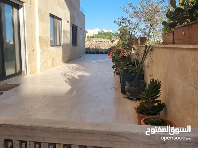 Ground floor apartment with terraces and garden