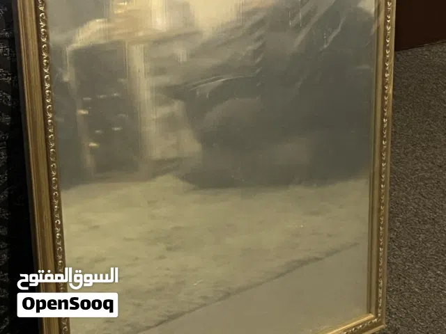 مرايا لون ذهبي يوجد قطعتين منه