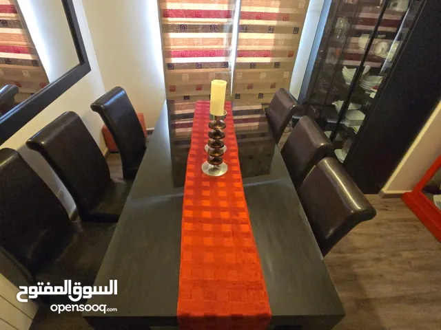 Table with 6 leather chairs