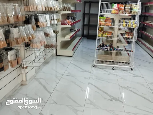 محل قهوة للايجار - على شارع ابو عديلة - الزرقاء الجديدة - خلف سامح مول وكارفور هناك محلات للايجار