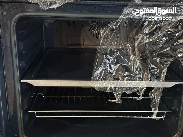 Brand new Samsung electric over 60cm silver and black, with 1 year warranty
