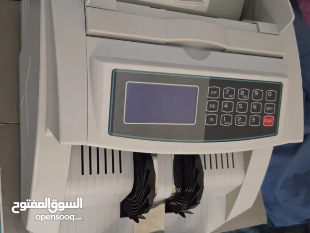 مكينة عد نقود وكاشف التزوير