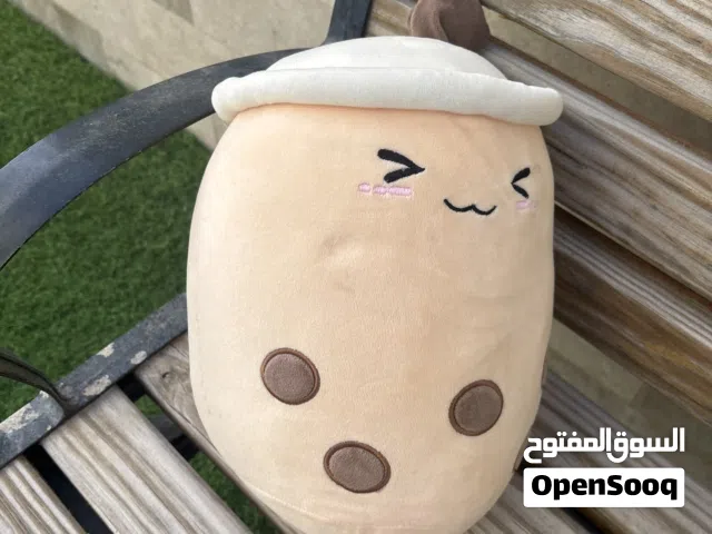 دمية على شكل كأس جميلة وناعمة وتن أمه الطفل