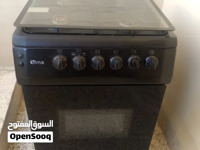 فرن صغير لون اسود بحالة الوكالة