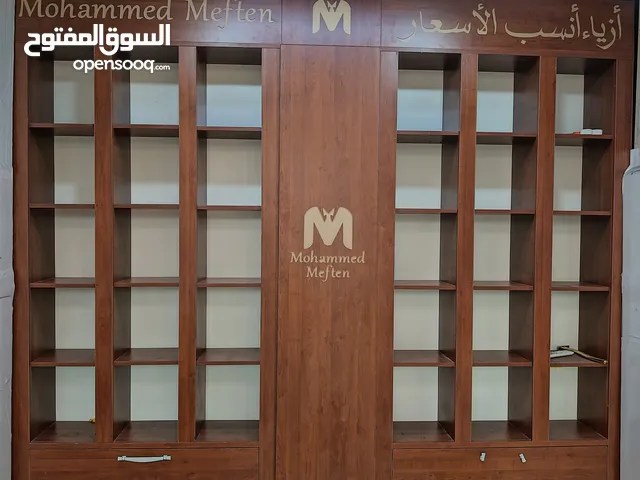 ديكور محل ملابس رجالية السعر 300 ألف