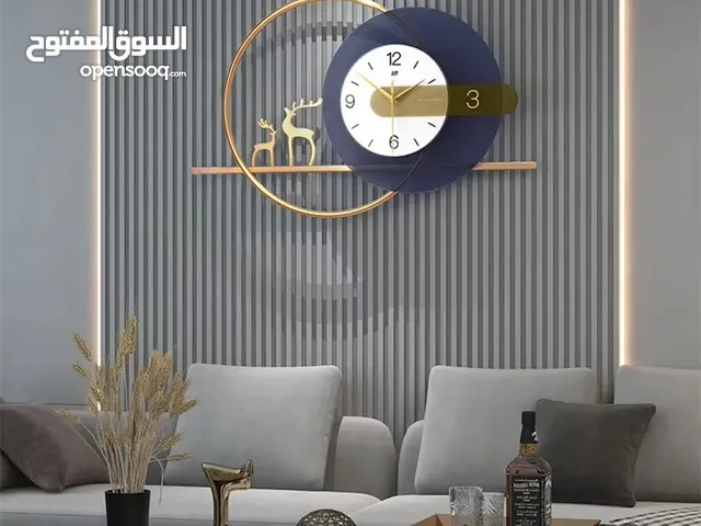ساعات حائط منزلية بتصاميم فخمة