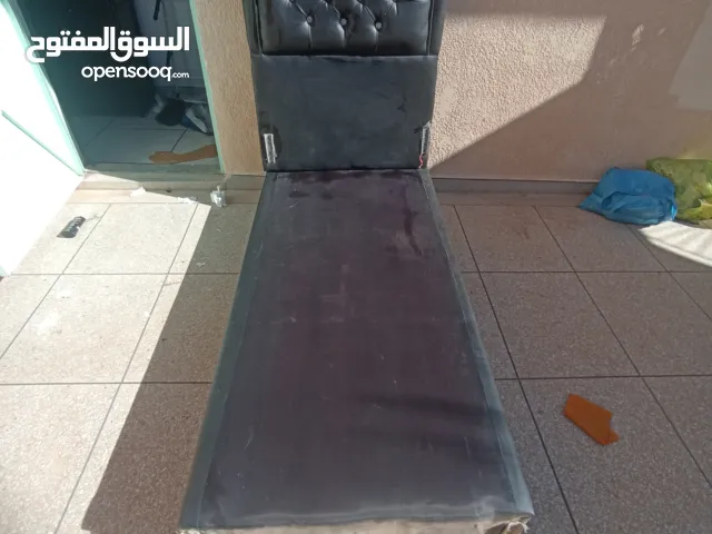 أريكة فردية جلد مستعملة