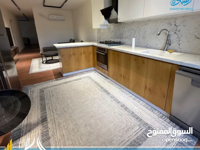 شقه عصريه مميزه للايجار ضاحيه الريحان قرب لكاسا