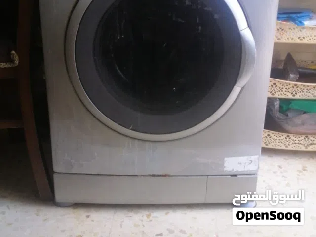 غسالة فيستل و طقم كنب 7 مقاعد