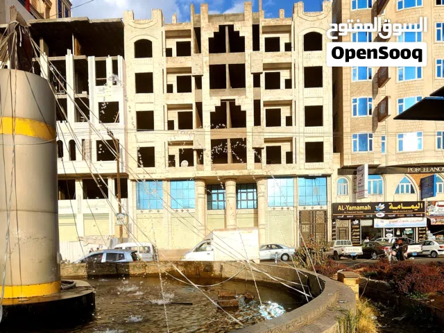 عمارة تجارية سكنية امام جولة الولاعه مساحةعشر لبن حر