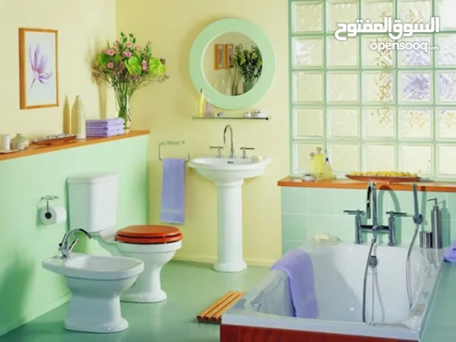 تجديد حمامات تكسير ونقل مخلفات وسباكة وكهرباء وارضيات وحوائط تشطيب تام - خبرة 1