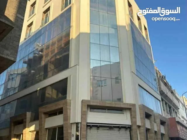 مبنى تجاري كبير للبيع بكامل الأوراق والمواصفات الفنية العالمية وبسعررر حررق