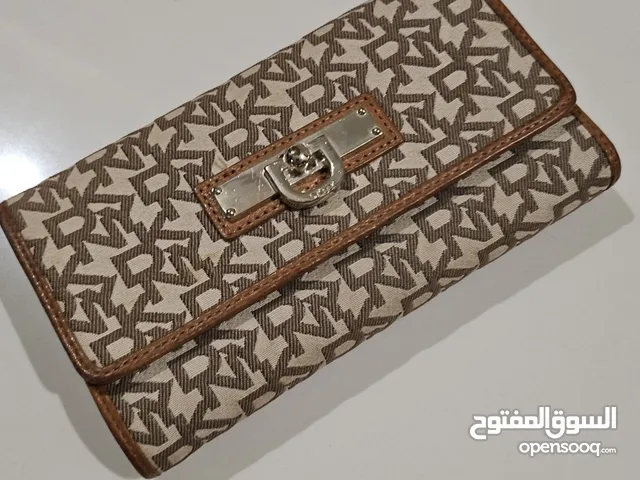 brown DKNY for sale  in Central Governorate