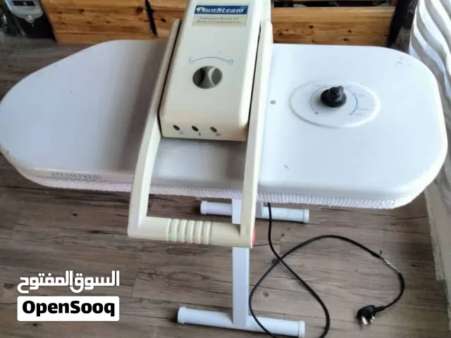مكواة ملابس بالضغط بالبخار (RunSteam)