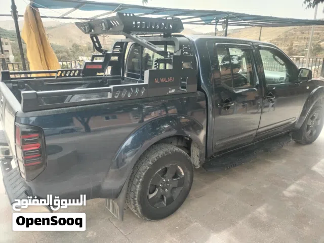 2013 نيسان نافارا LE