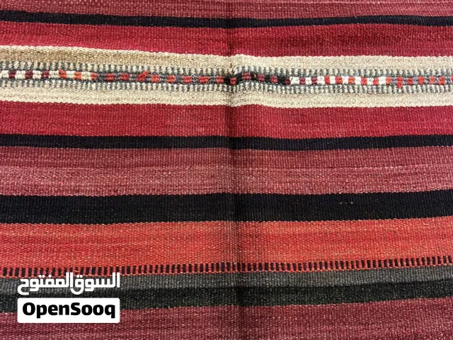 بساط قديم صوف