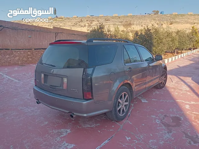 كاديلاك موديل 2004 بحالة الوكاله مرخصة لشهر 12 ماتور جديد بيان جمركي ما نزل ع رخصه لسه