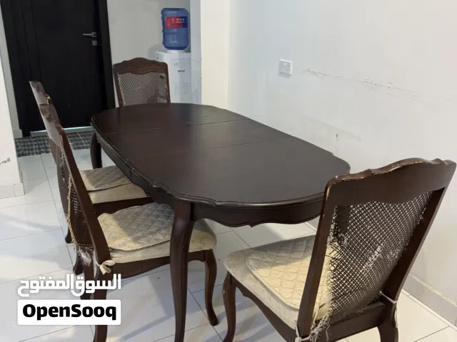 Urgent Sale.4 Seater Size-Adjustable Dining table for Sale (Bahrain wood)