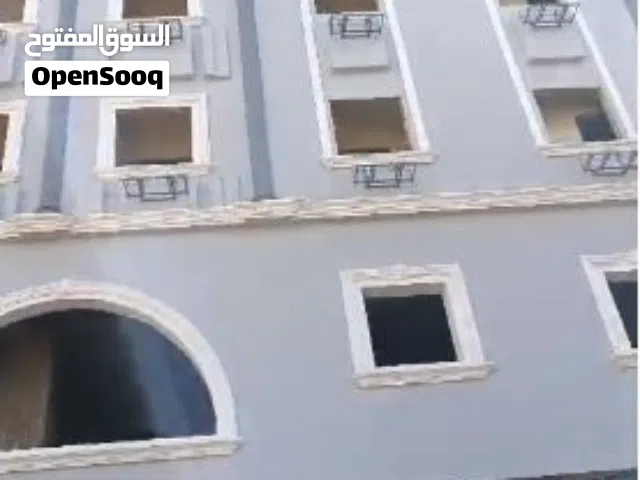 محل تجاري بالدور الارضي ببرج الأطباء بأسيوط مساحة 13م بشارع26 يوليو المتفرع من شارع يسري راغب