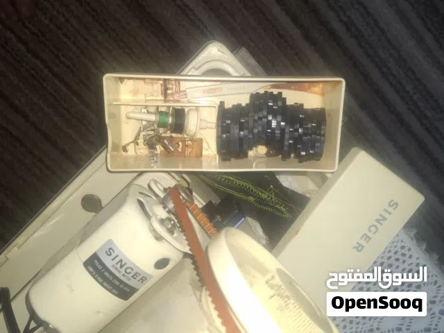 ماكنة خياطه وحبكه