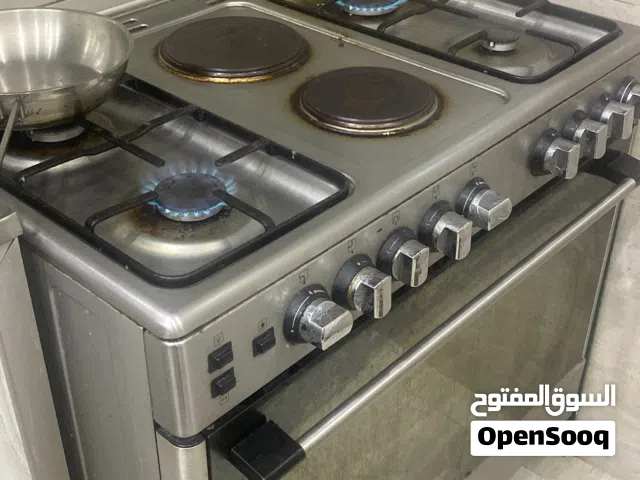 فرن اربع عيون وشوله كهرباء حجم كبير عيون غاز ازرق .