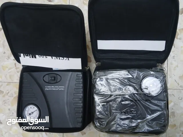 طقم زينون أبيض + منفاخ هواء + كاسيتات