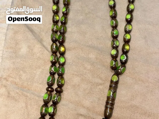 مسابح يسر مزدوج بالكهرمان