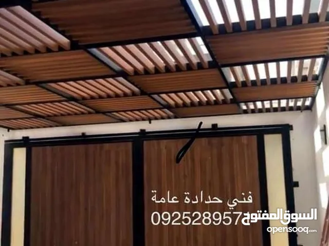 فني لحام حدادة عامة لحام ابواب و نوافد و مضلات و هناقر و صيانتها تركيب اي قفل تركيب لافتات وصنع كل.