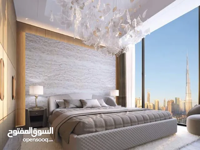 فرصة استثمار مميزة: شقة فاخرة بإطلالة خلابة على أبراج دبي الشاهقة بمقدم 20% وبخطة دفع مرنة