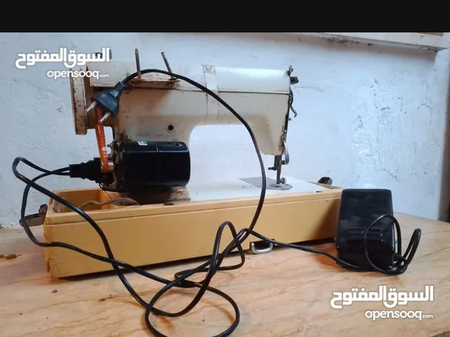 مكينه خياطه شغاله معاها شرطوري