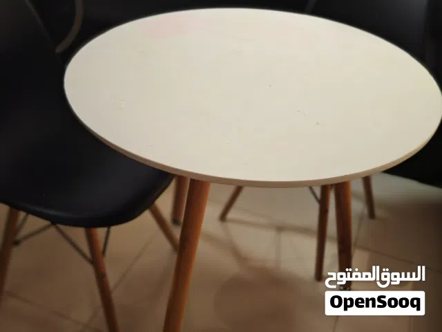 set of 2 chairs and round table
