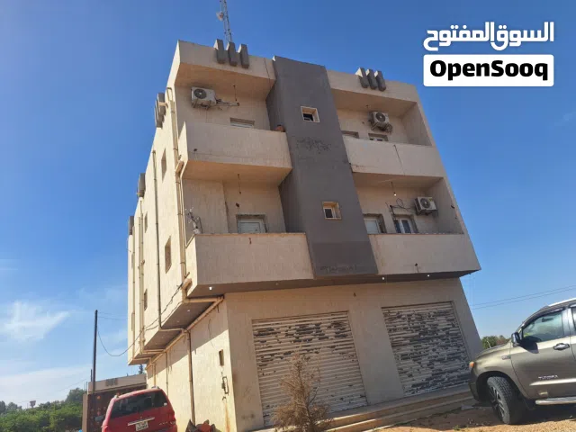 عقار تجاري على الرئيسي للبيع في قصر بن غشير