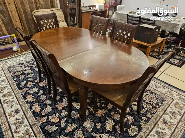 Malaysian dining table with six chairs