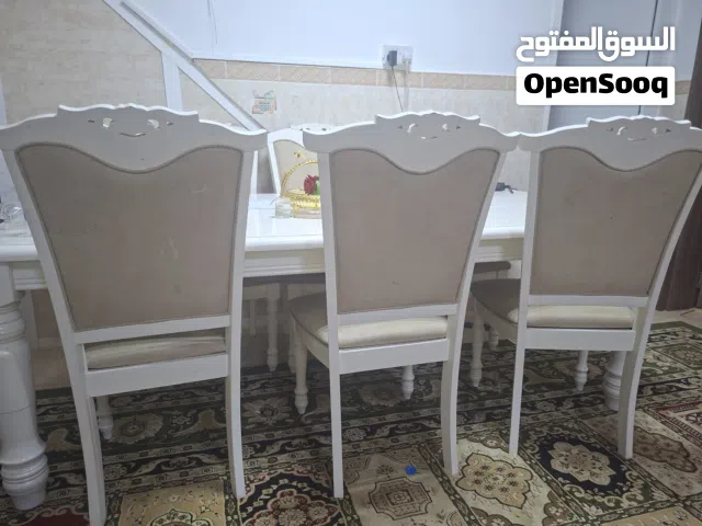 almost new table used with 8 chairs to king chairs and 6 normal chairs