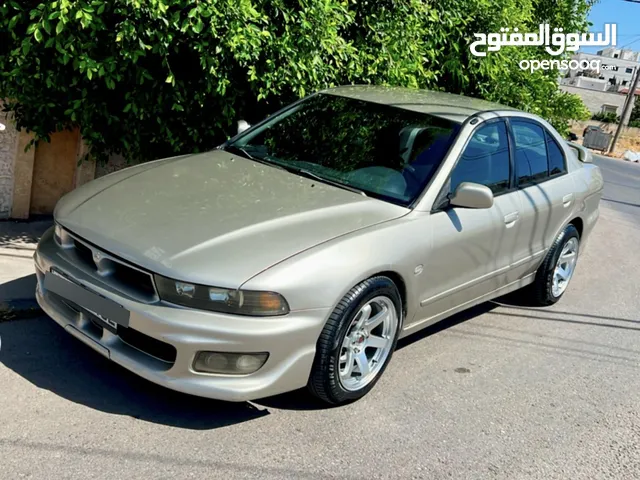 ميتسوبيشي جالنت 2005 مميزة جدا لمحبين التميز فل كامل عدا الفتحة
