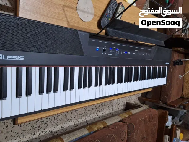 بيانو اليسيس ALESIS 88 مفتاح بحال الوكالة غير مستخدم مع كامل ملحقاتة
