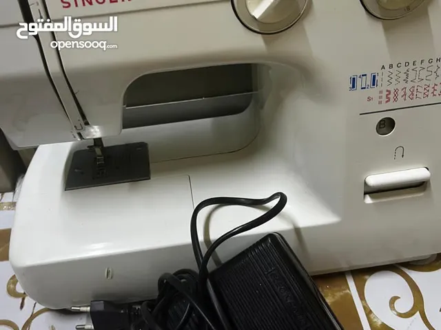 sweing machine for urgent sale, used for very less time. good company SINGER