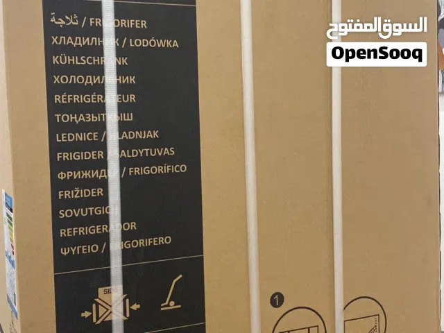 ثلاجه جديده بكرتونها ب95 دينار