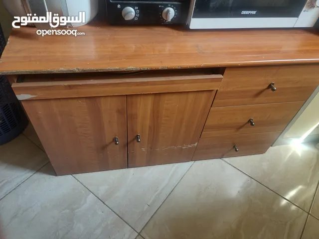 Table with 2 cabinets and 3 drawers