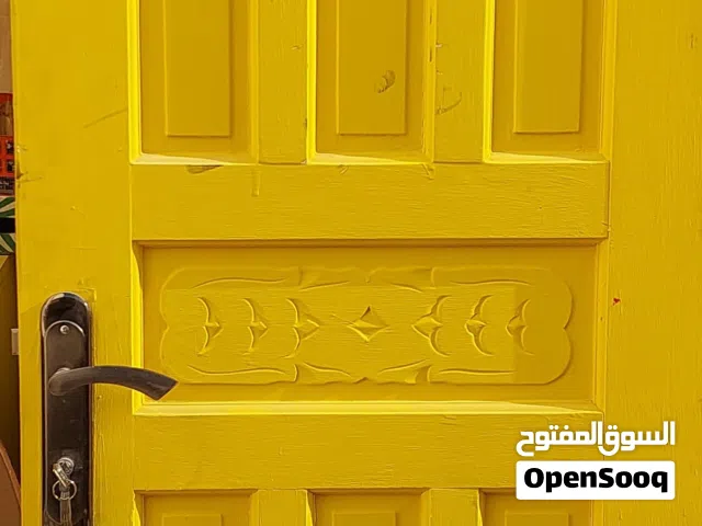 باب خشبي متين وقوي A sturdy and strong wooden door