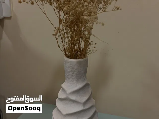 Vase with dried flowers